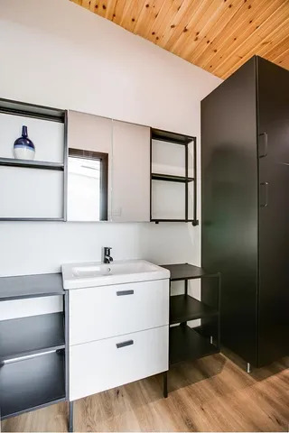 a view of a swimming pool and an outdoor seating