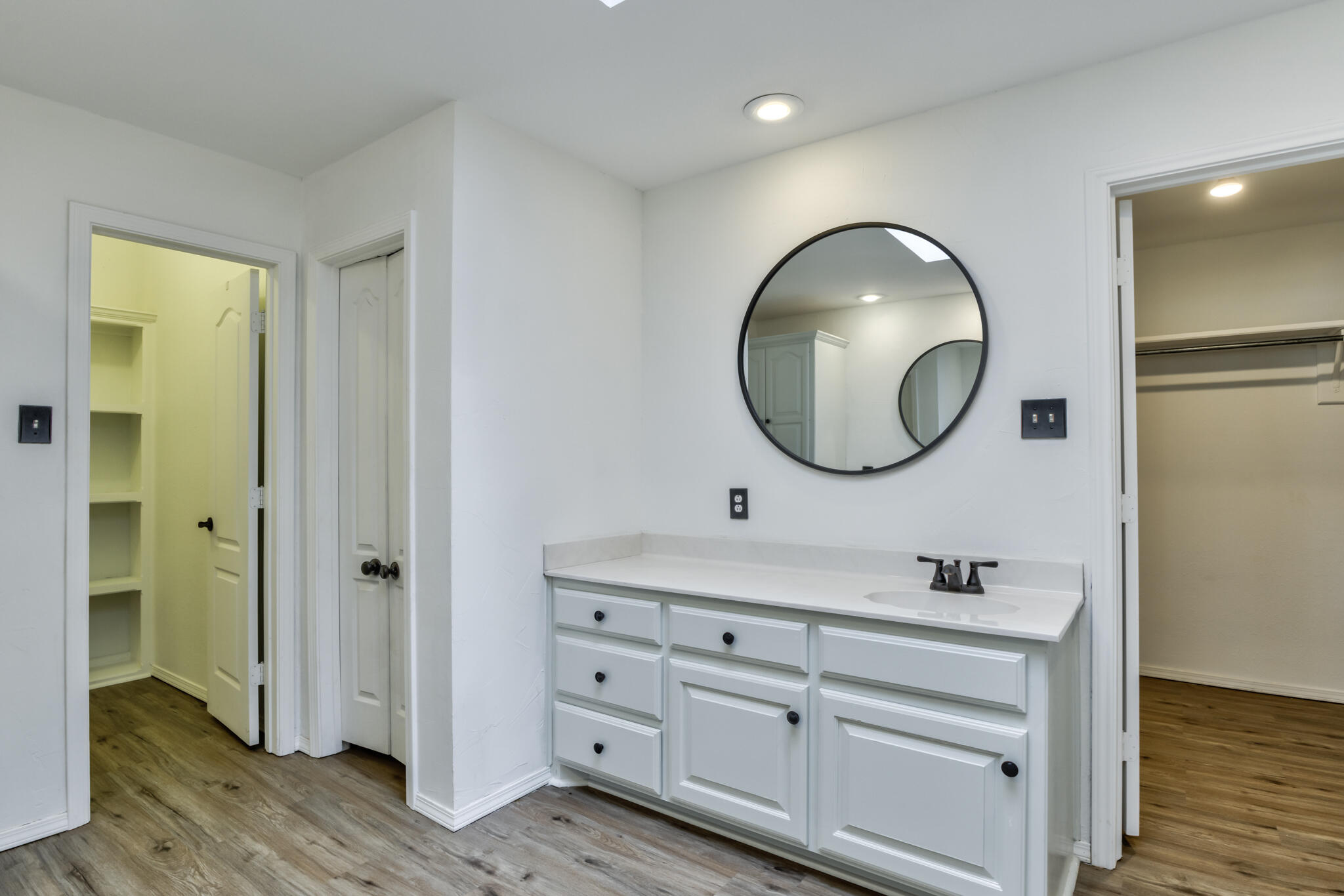 544 Highway 87 Wilson, TX 79381 - Photo 43 of 86 a bathroom with a mirror and a sink