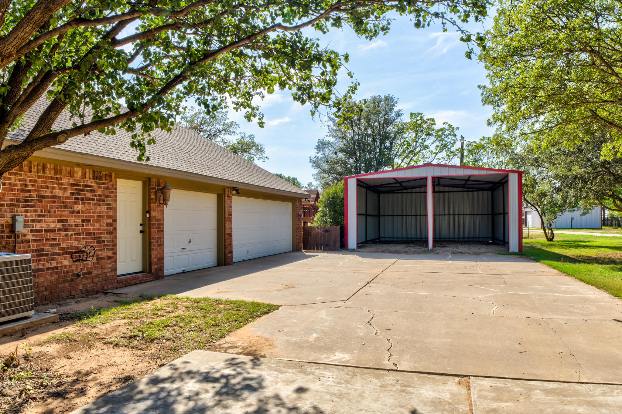 544 Highway 87 Wilson, TX 79381 - Photo 74 of 86 a front view of a house with a yard and garage