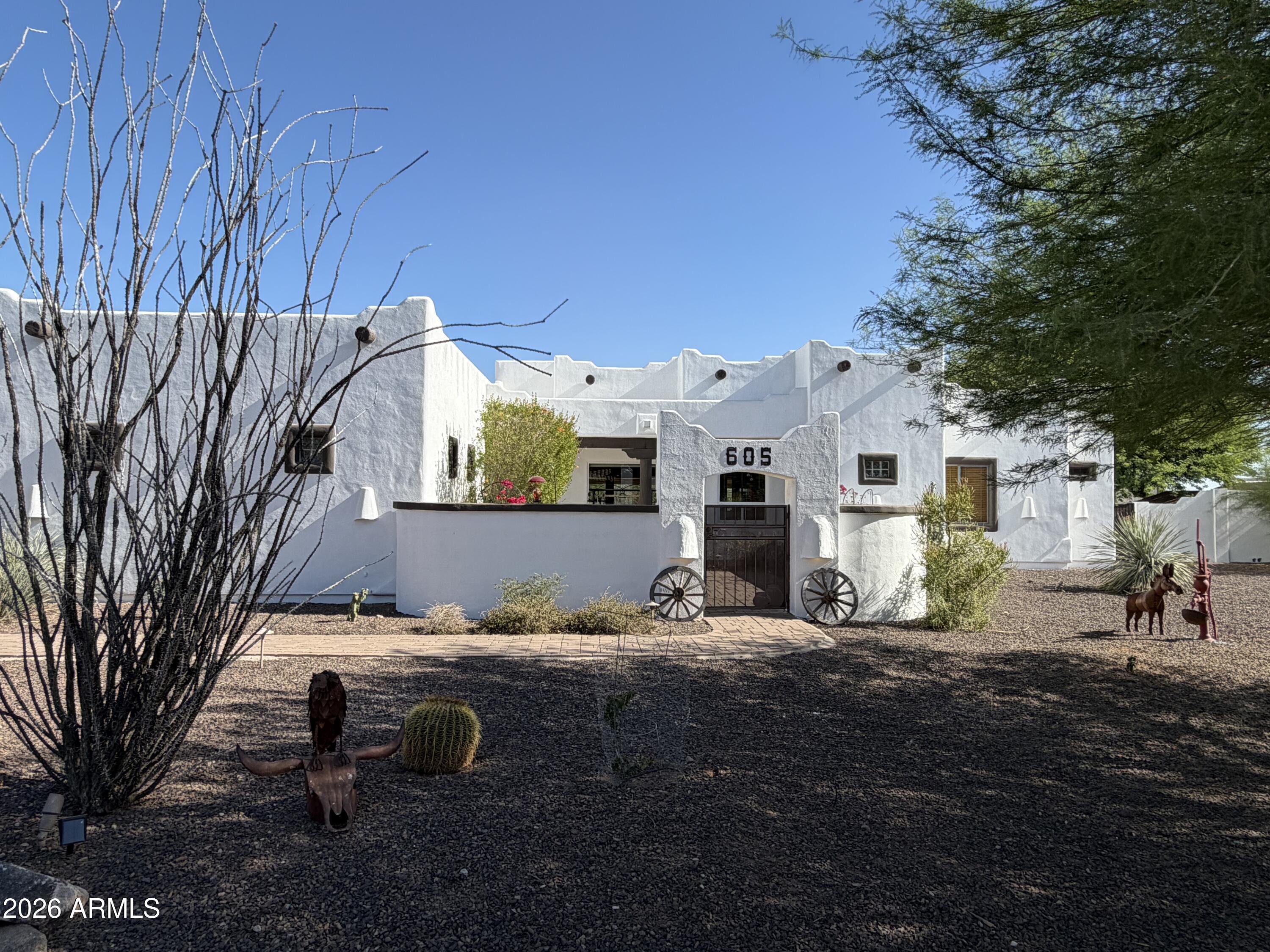 605 West Ridgecrest Road Phoenix, AZ 85086 - Photo 1 of 40 a view of a house with backyard and sitting area