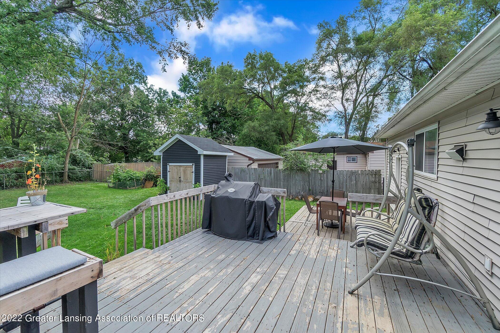 5802 Hughes Road Lansing, MI 48911 - Photo 29 of 37 29-5802-Hughes-Rd-WindowStill-Real-Estat