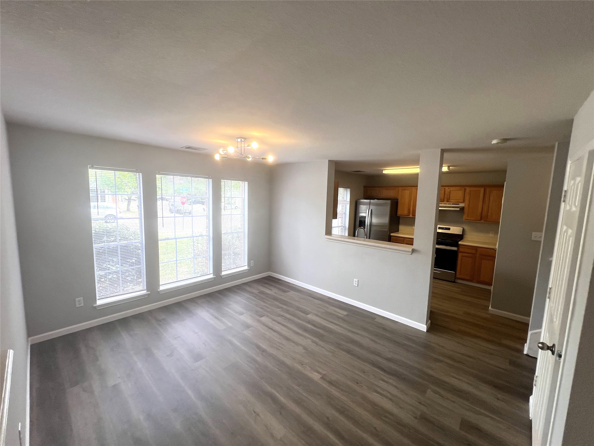 15601 Valerie's Cove Pflugerville, TX 78660 - Photo 5 of 10 Dining room featuring new light fixture