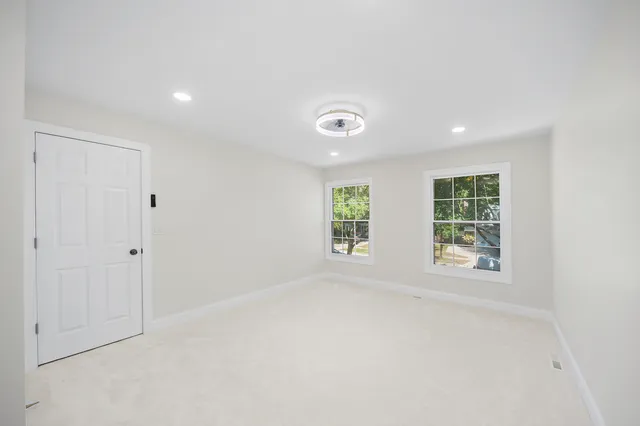 an empty room with windows