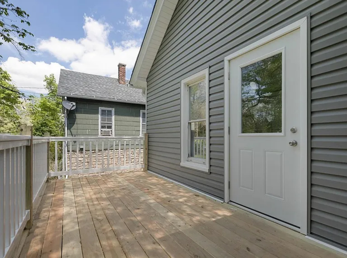 453 Water Street Joliet, IL 60436 - Photo 13 of 14 a front view of a house with a large window