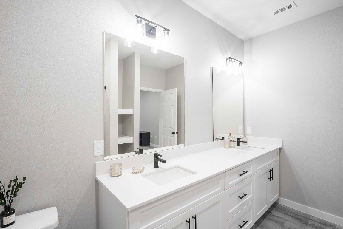 2101 Reinke Road, Unit 8103 Waller, TX 77484 - Photo 9 of 24 a bathroom with a sink double vanity and a mirror