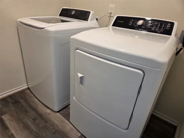 a utility room with dryer and washer