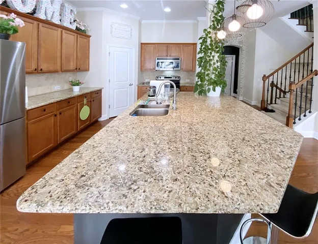a view of kitchen with furniture and flat screen tv