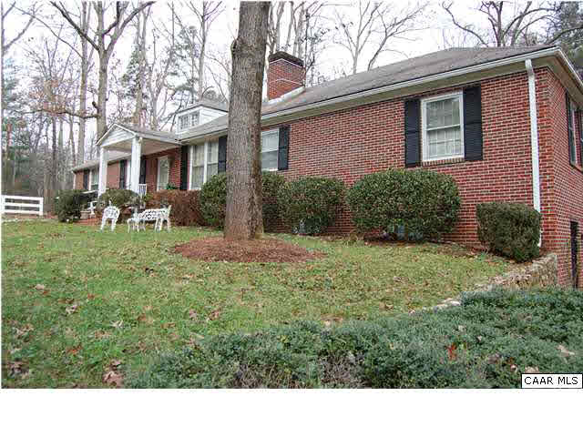 5808 Louisa Road Keswick, VA 22947 - Photo 3 of 4 a view of a house with a backyard