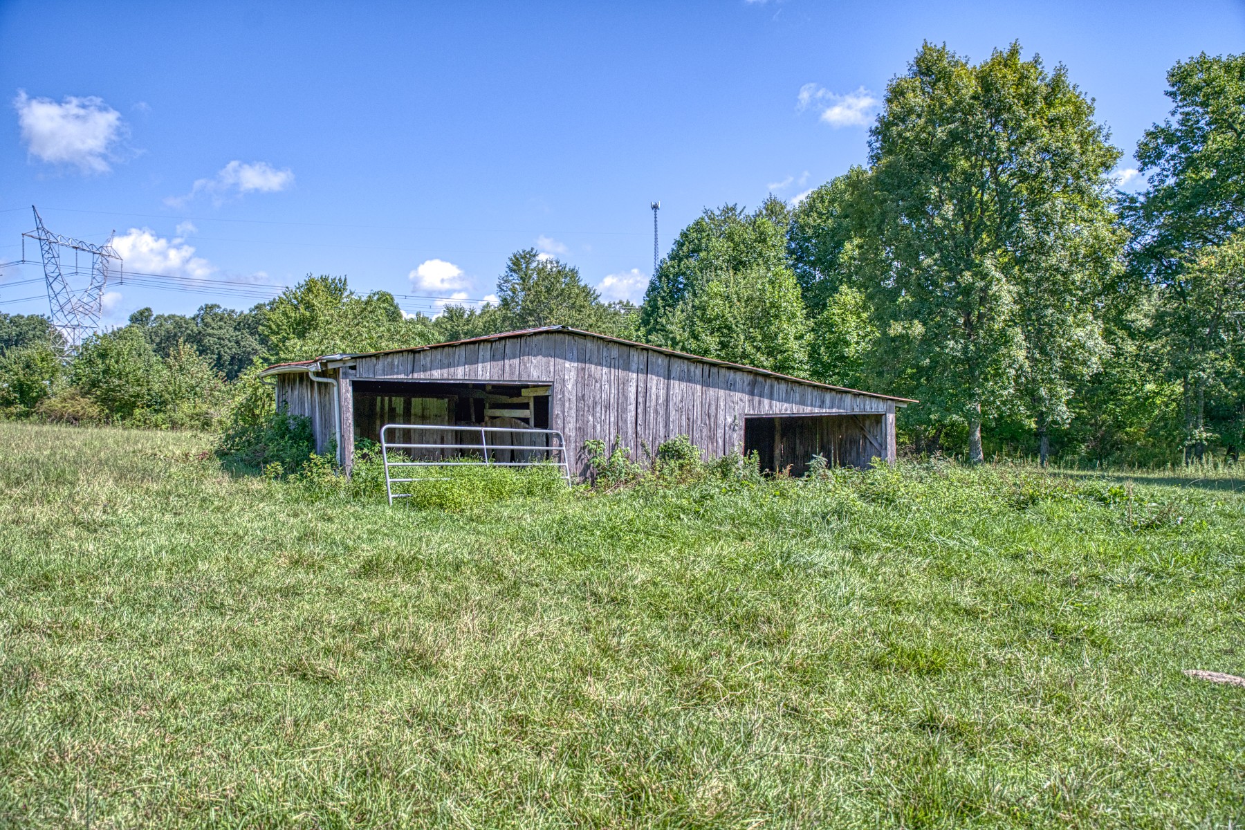 2110 Jr Camp Road Monterey, TN 38574 - Photo 11 of 35 a front view of a house with garden