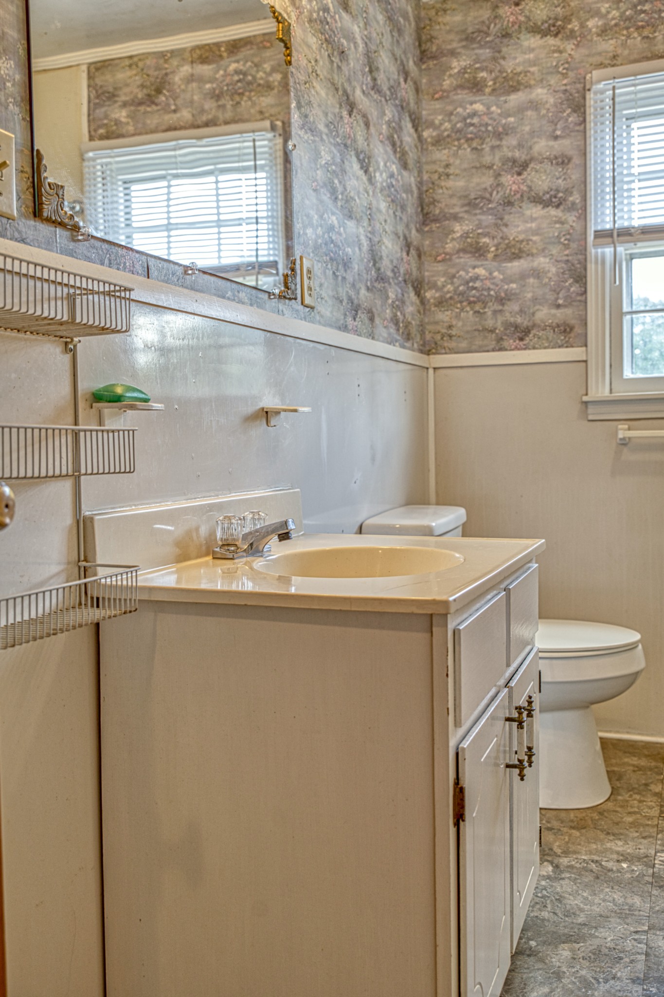 2110 Jr Camp Road Monterey, TN 38574 - Photo 34 of 35 a bathroom with a sink a toilet and a window