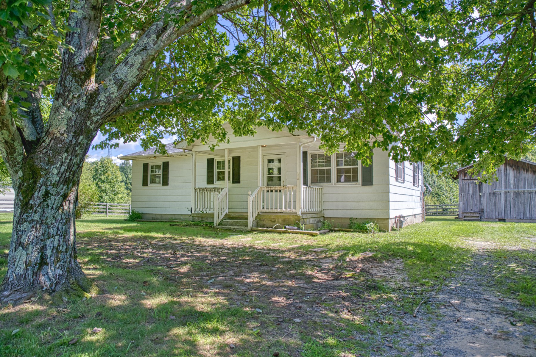 2110 Jr Camp Road Monterey, TN 38574 - Photo 7 of 35 a house that has a tree in front of it
