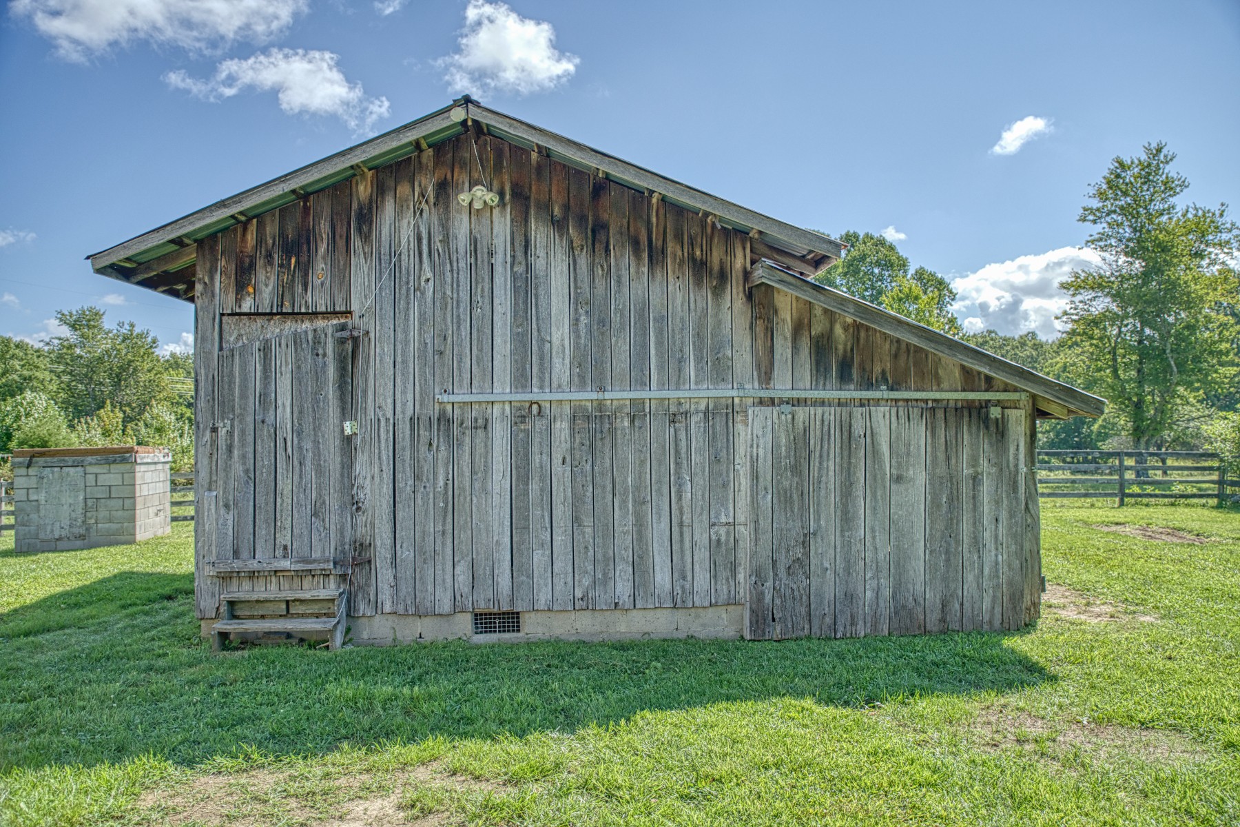 2110 Jr Camp Road Monterey, TN 38574 - Photo 8 of 35 a front view of a house with garden