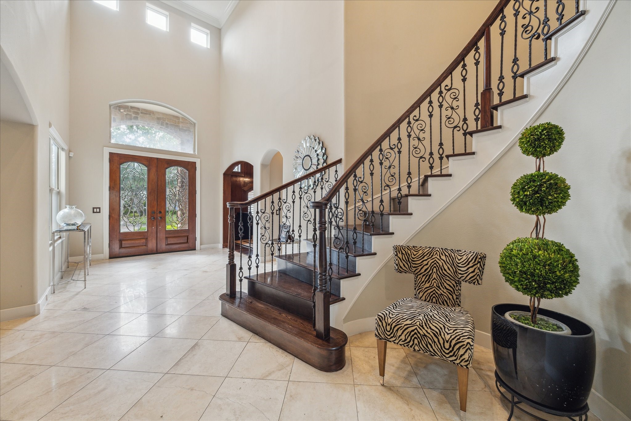 3319 Bridgeberry Lane Houston, TX 77082 - Photo 5 of 50 Two story formal entry with stone floors and dramatic wood staircase.