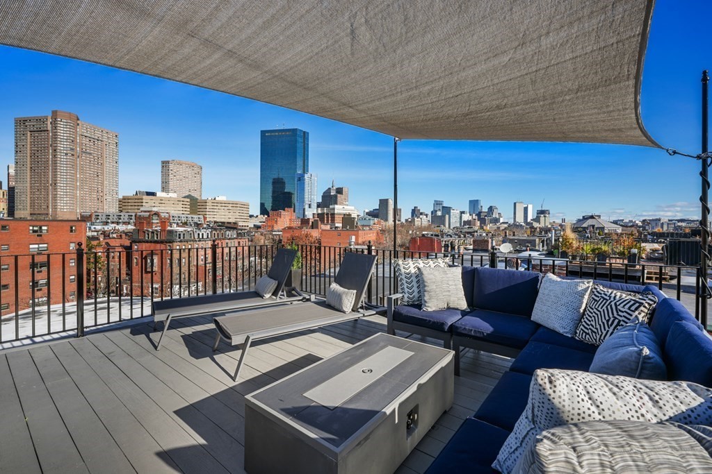 9 Columbus Square, Unit 2 Boston, MA 02116 - Photo 19 of 42 a view of a terrace with furniture