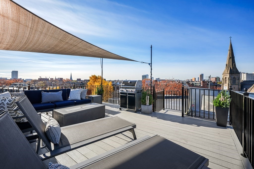9 Columbus Square, Unit 2 Boston, MA 02116 - Photo 21 of 42 a view of a terrace with seating space
