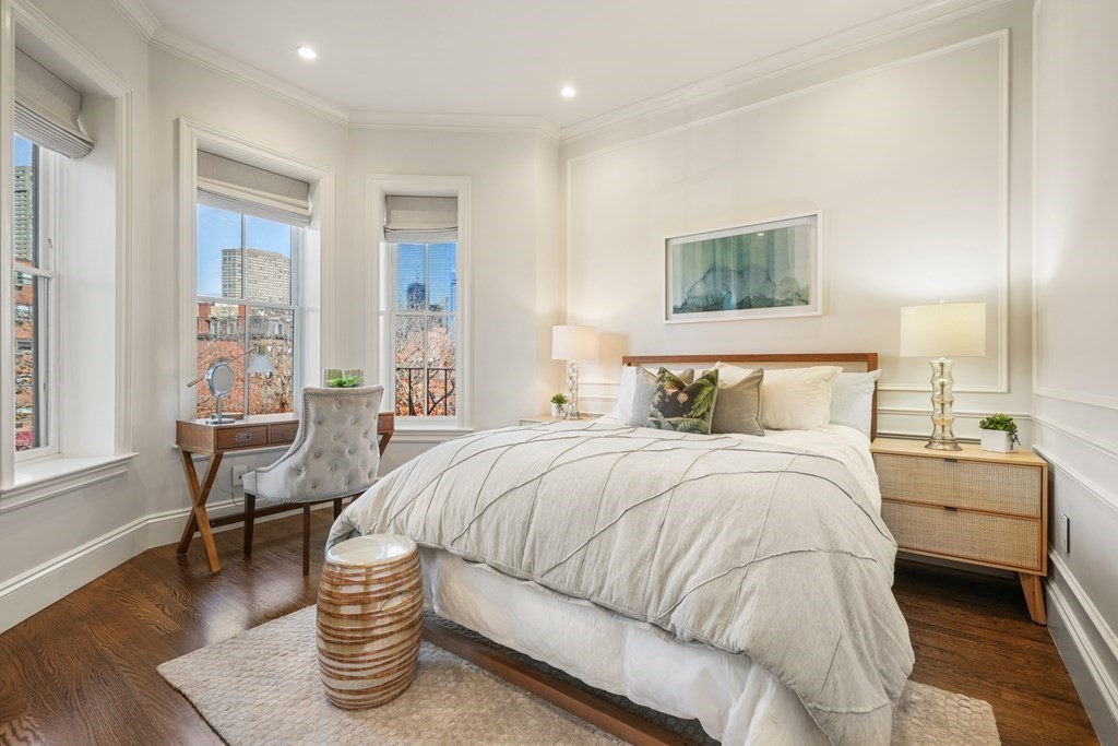 9 Columbus Square, Unit 2 Boston, MA 02116 - Photo 30 of 42 a bedroom with bed and window