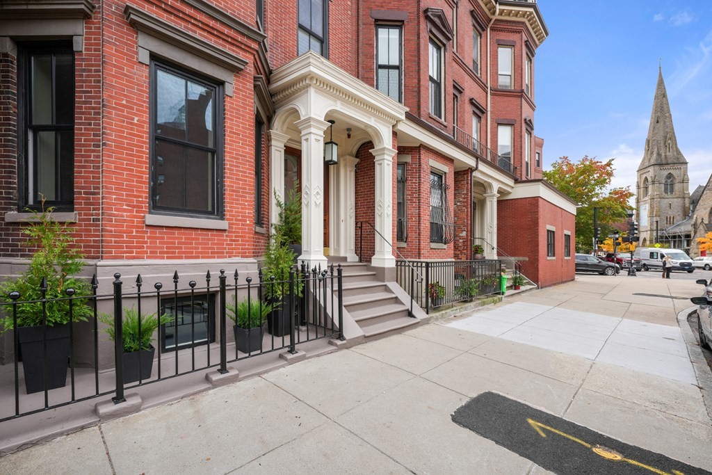 9 Columbus Square, Unit 2 Boston, MA 02116 - Photo 41 of 42 a view of a building with a street