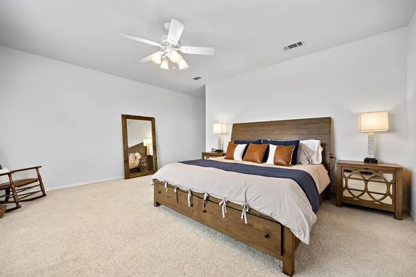 a living room with furniture fireplace and a fireplace