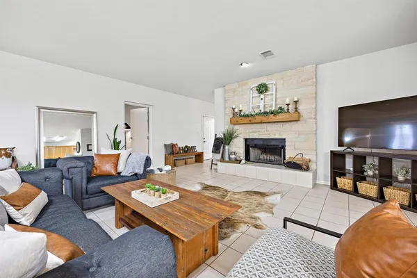 a house with swimming pool in front of it