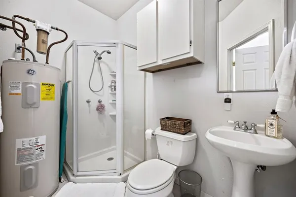 a kitchen with appliances cabinets and a sink