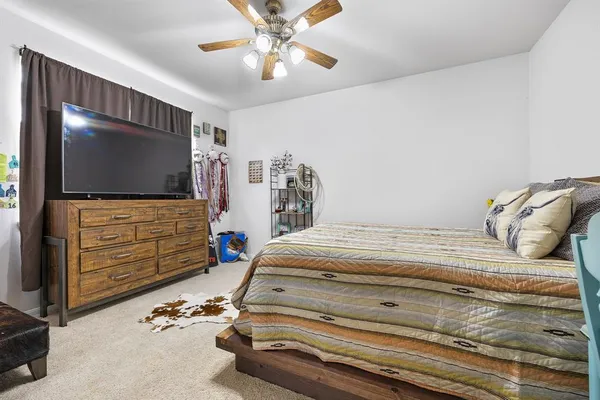 a view of a bathroom with a tub and shower