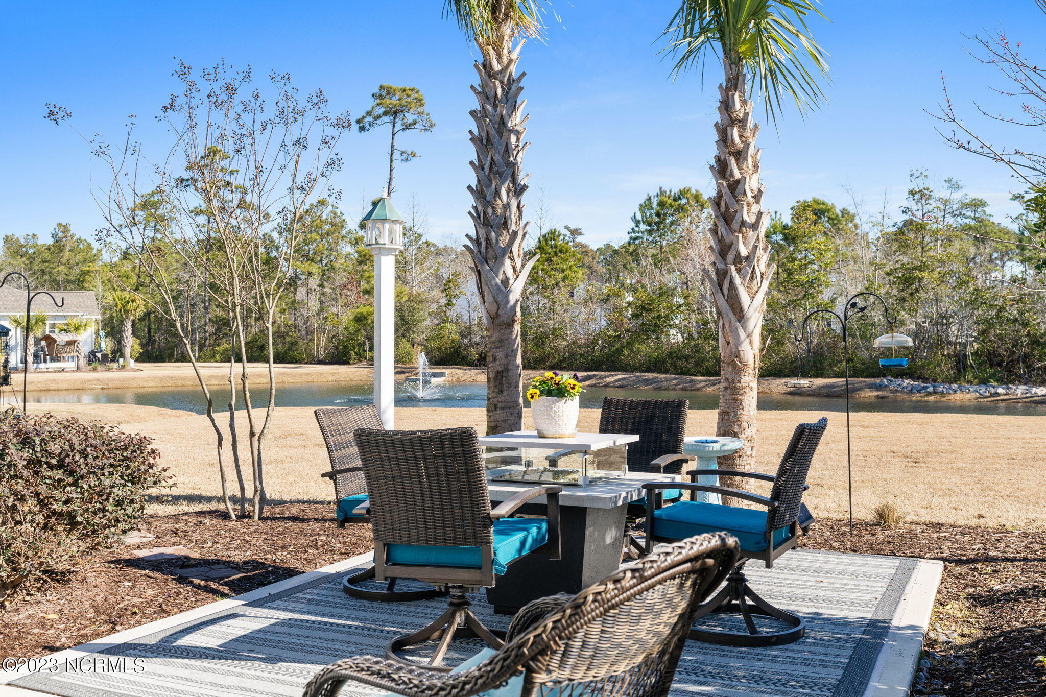 1423 Long Pond Road Southwest Ocean Isle Beach, NC 28469 - Photo 12 of 57 Enjoy the pond view from the patio