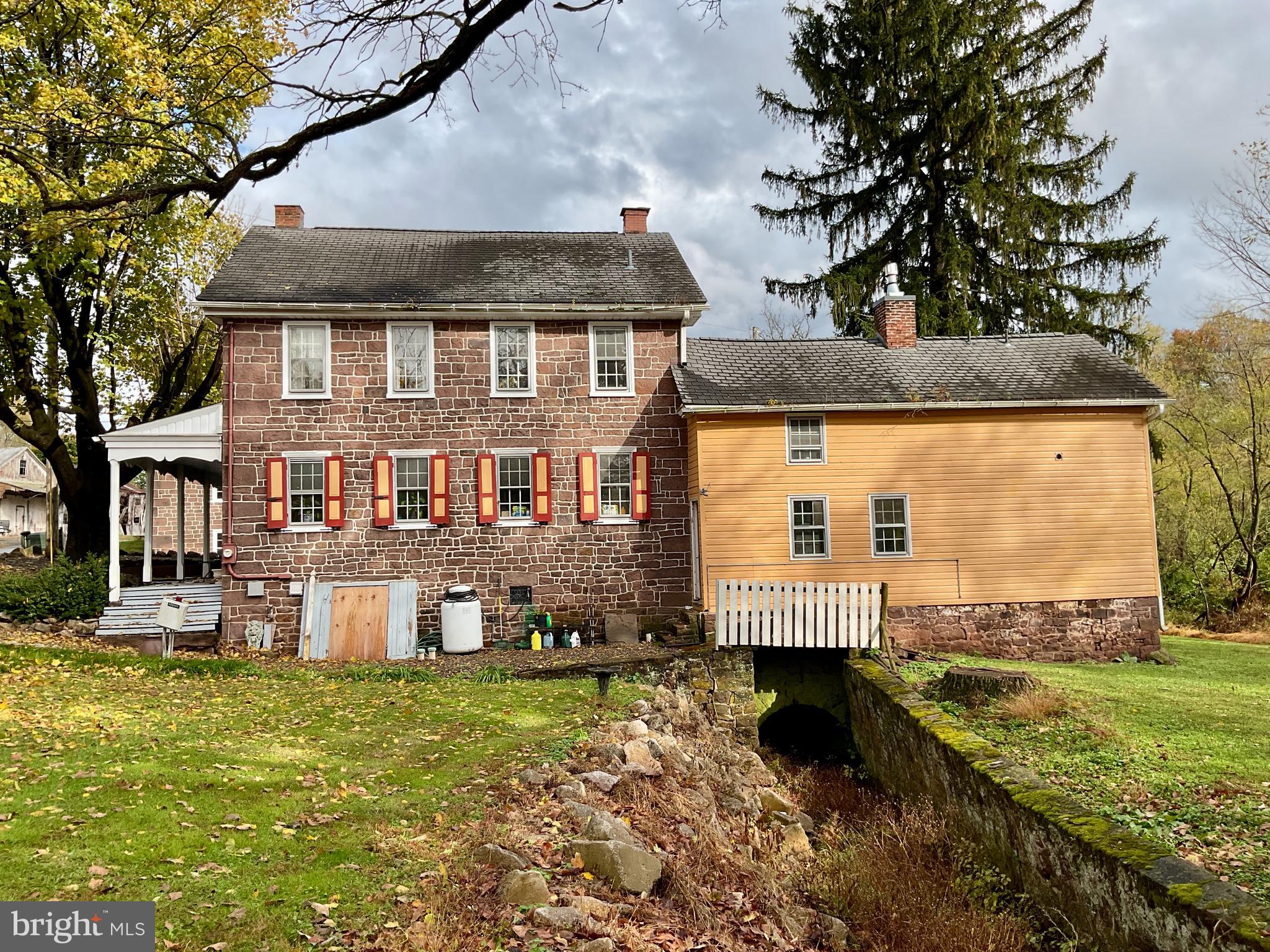 1145 Reading Road Narvon, PA 17555 - Photo 12 of 62 a front view of a house with garden