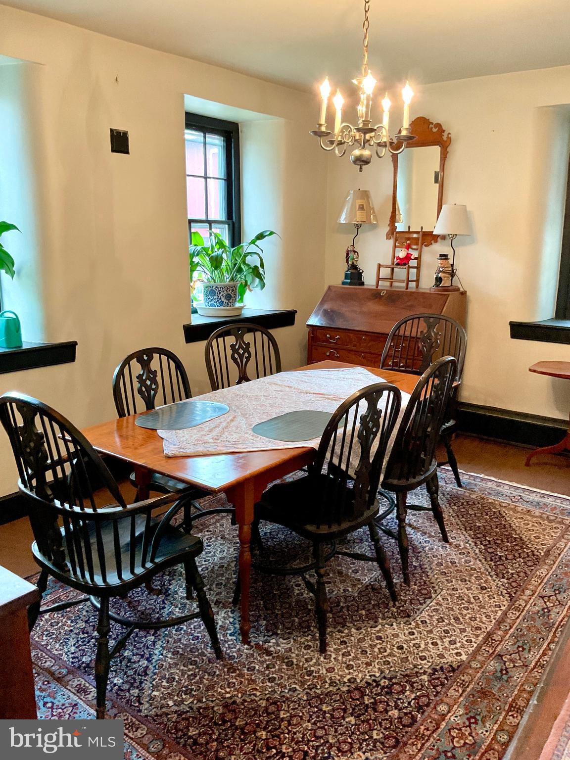 1145 Reading Road Narvon, PA 17555 - Photo 47 of 62 a view of a dining room with furniture and a chandelier