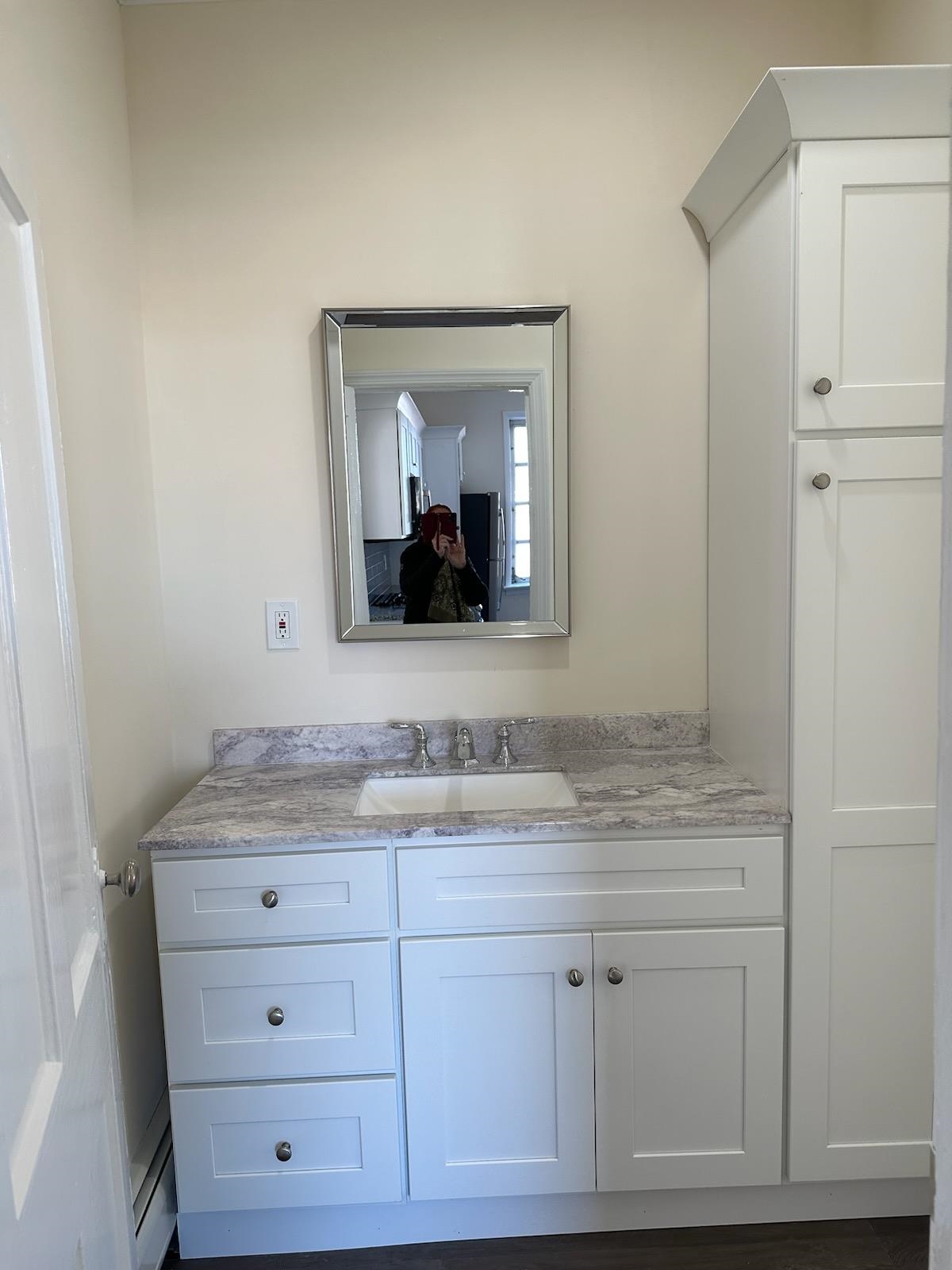 547 Avenue A, Unit 2 Bayonne, NJ 07002 - Photo 11 of 14 a bathroom with a sink vanity and mirror