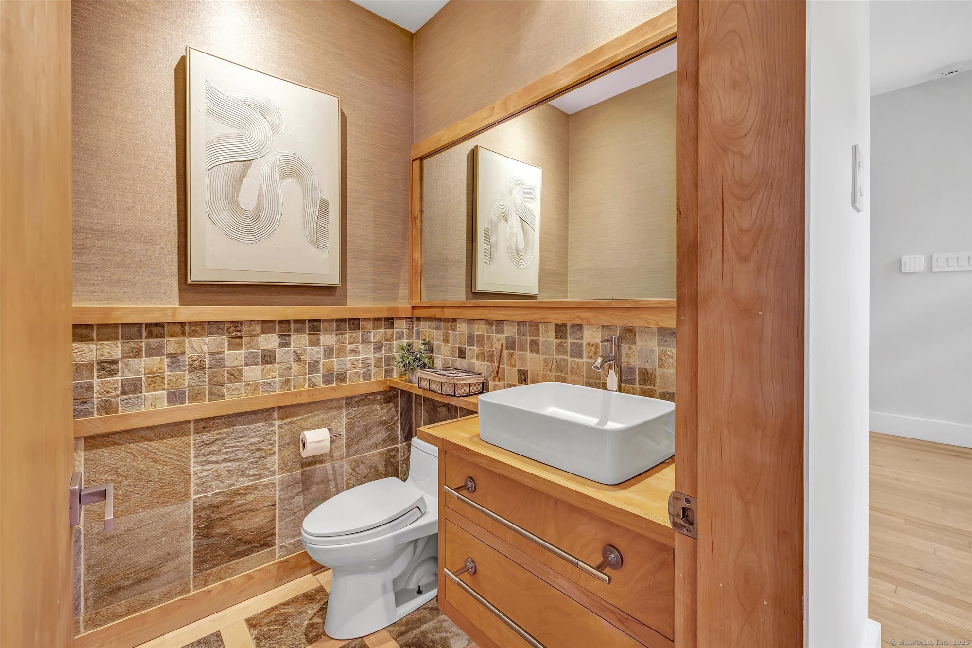 19 A Darbrook Road Westport, CT 06880 - Photo 21 of 40 a bathroom with a toilet sink and mirror