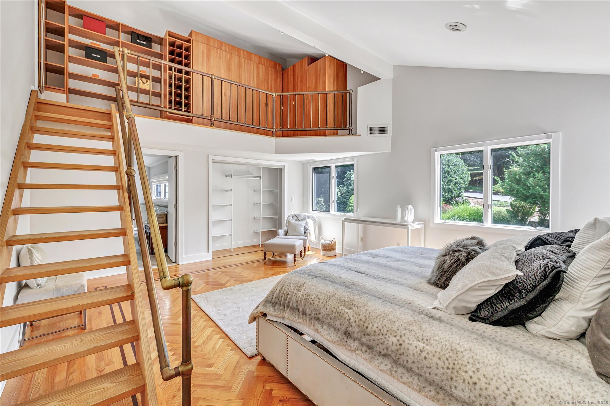 19 A Darbrook Road Westport, CT 06880 - Photo 22 of 40 a bed sitting in a bedroom next to a window