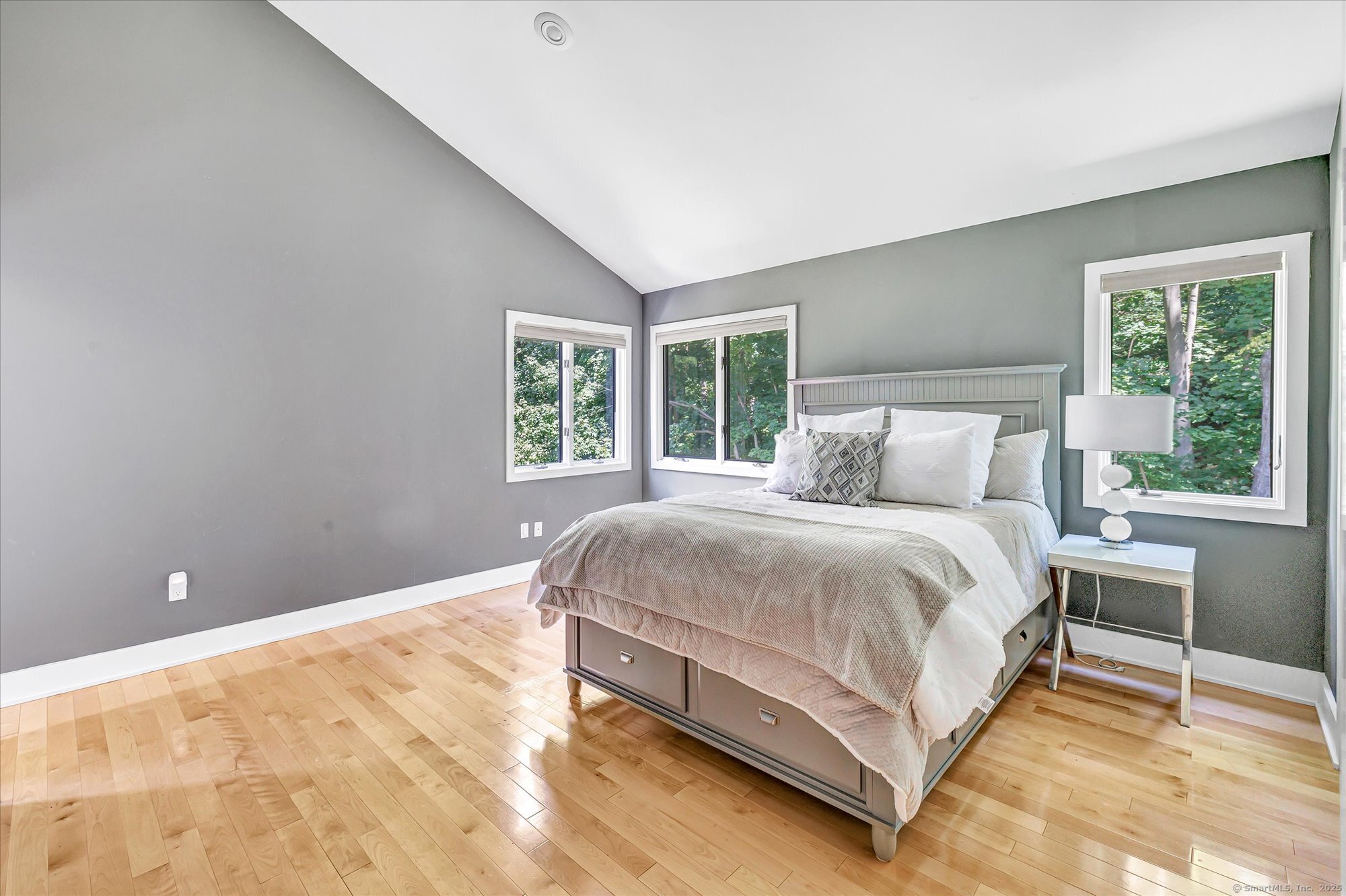 19 A Darbrook Road Westport, CT 06880 - Photo 26 of 40 a large bed sitting in a bedroom next to a window