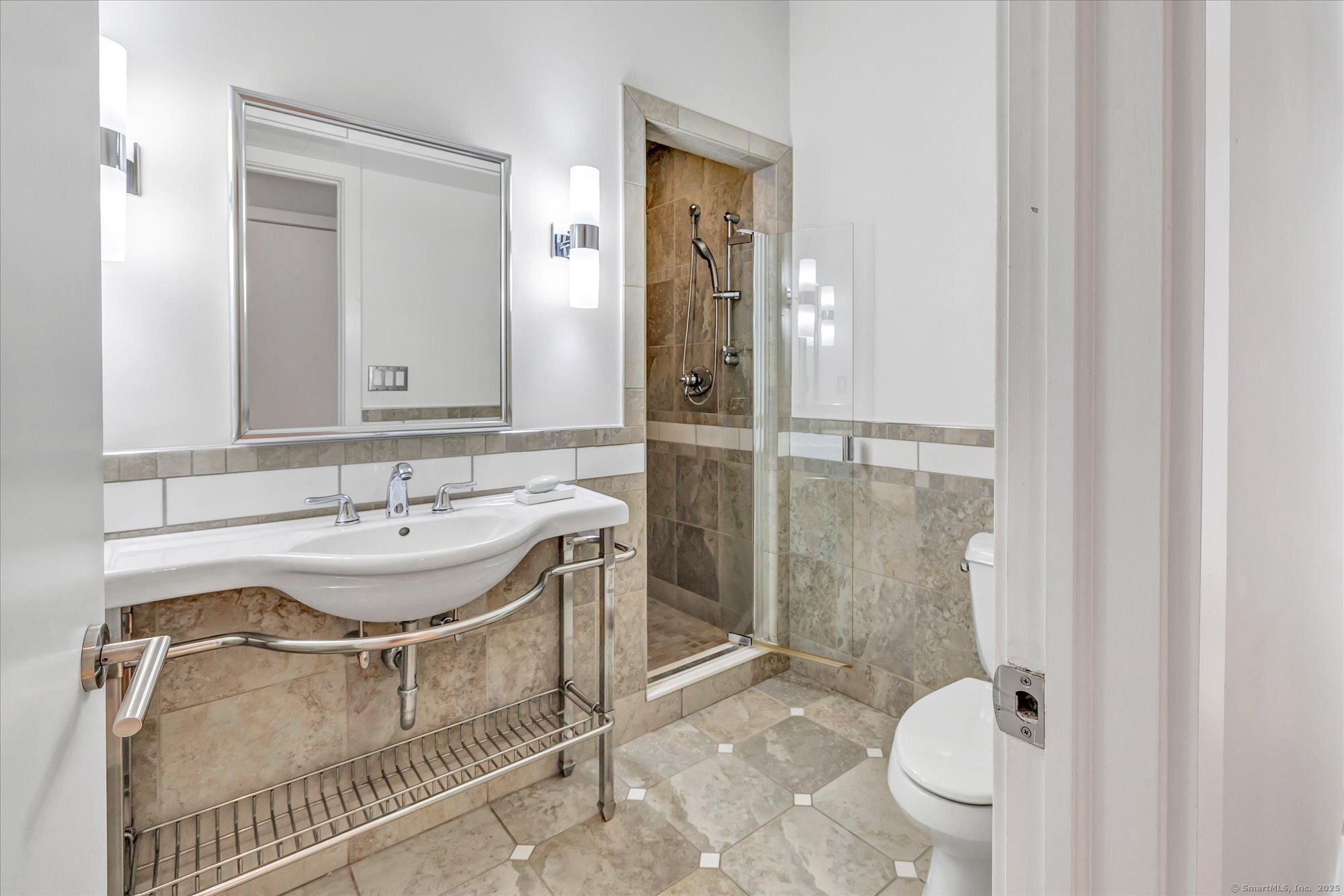 19 A Darbrook Road Westport, CT 06880 - Photo 30 of 40 a bathroom with a sink toilet and shower