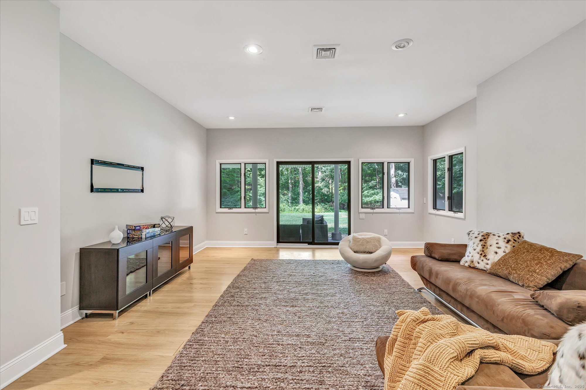 19 A Darbrook Road Westport, CT 06880 - Photo 31 of 40 a living room with furniture and floor to ceiling window