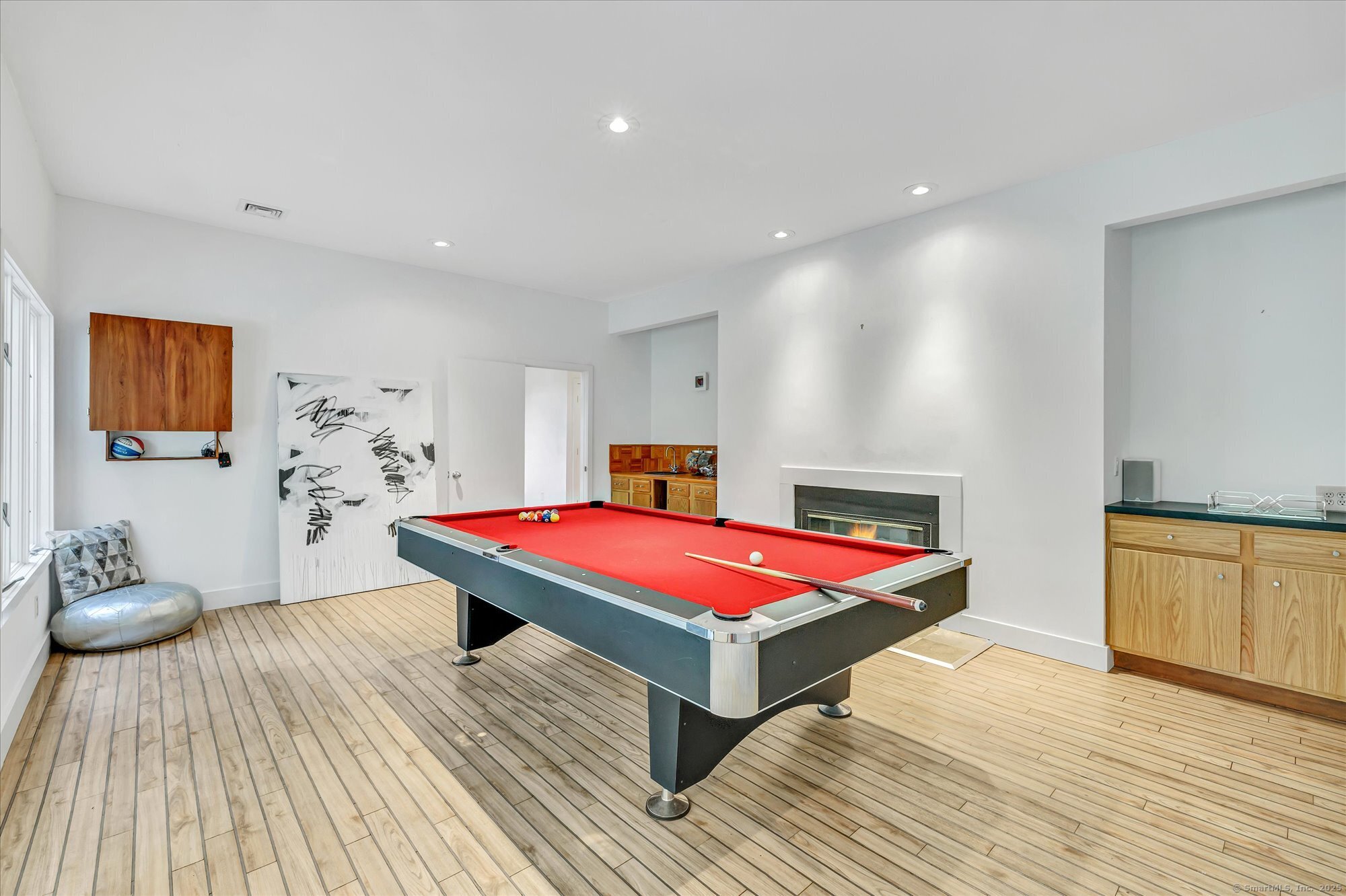 19 A Darbrook Road Westport, CT 06880 - Photo 32 of 40 a bedroom with a bed and wooden floor