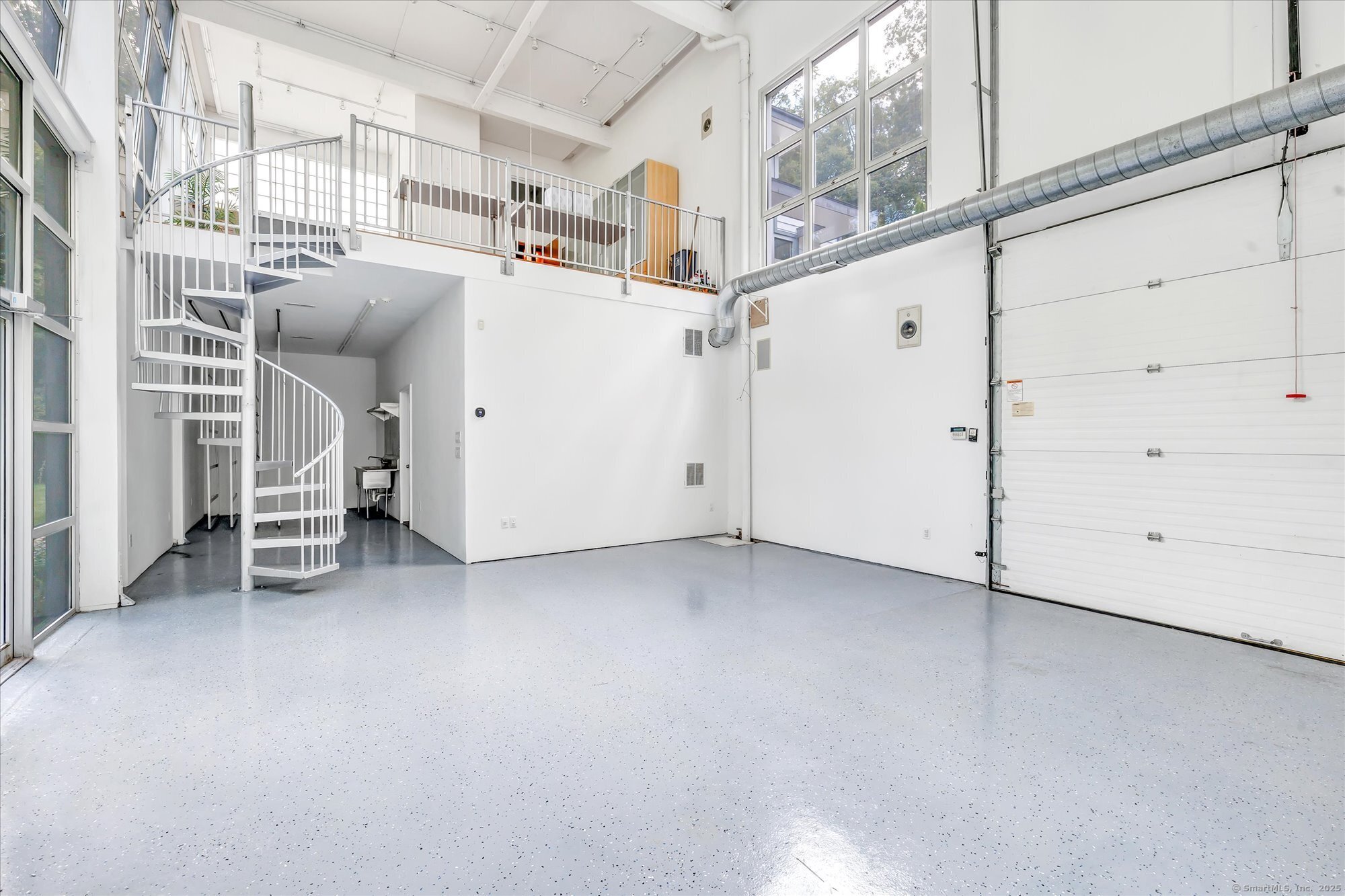19 A Darbrook Road Westport, CT 06880 - Photo 34 of 40 a view of a utility room with racks on the wall