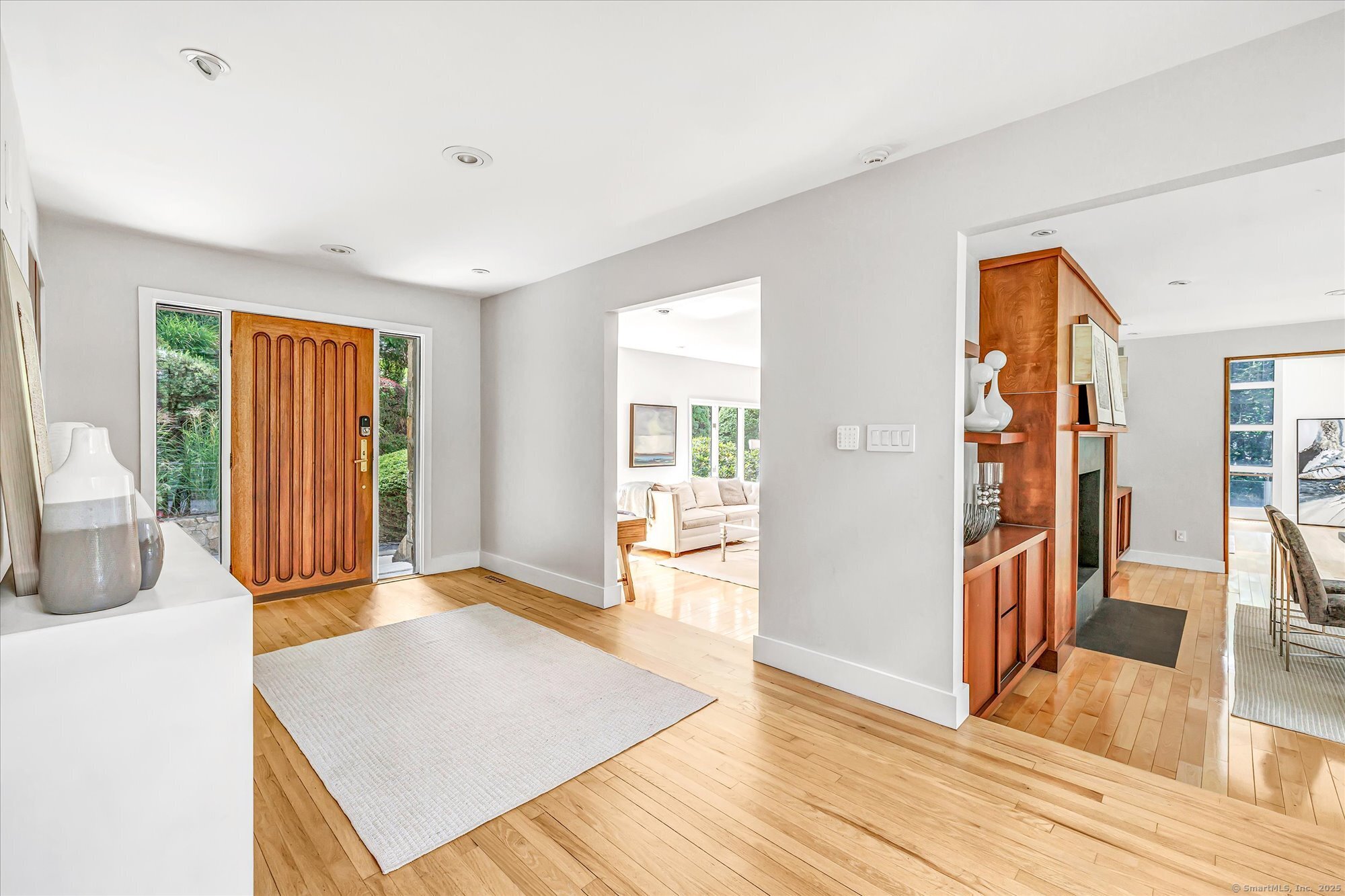 19 A Darbrook Road Westport, CT 06880 - Photo 4 of 40 a view of an empty room with wooden floor and a window