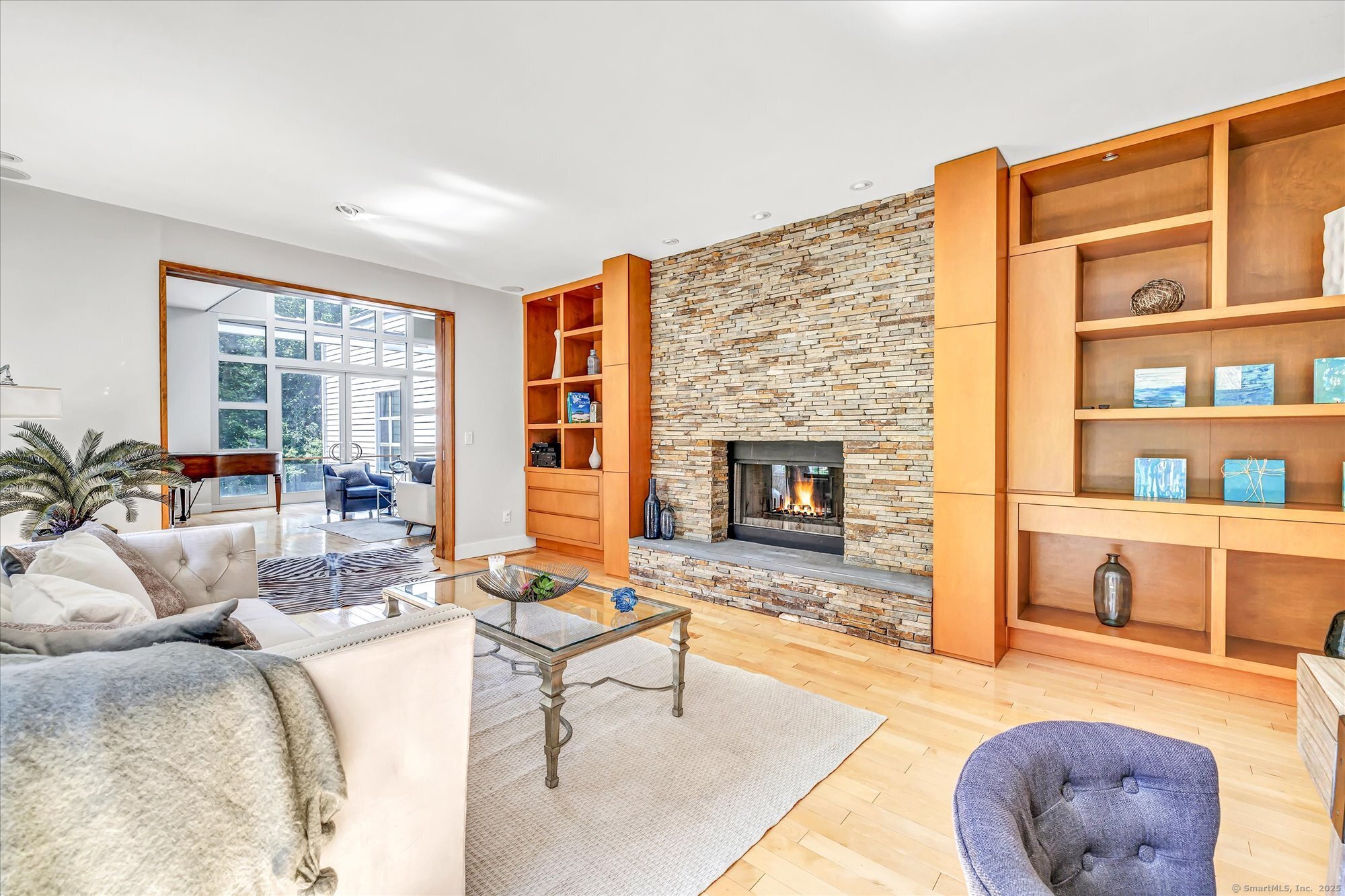 19 A Darbrook Road Westport, CT 06880 - Photo 6 of 40 a living room with furniture and a fireplace