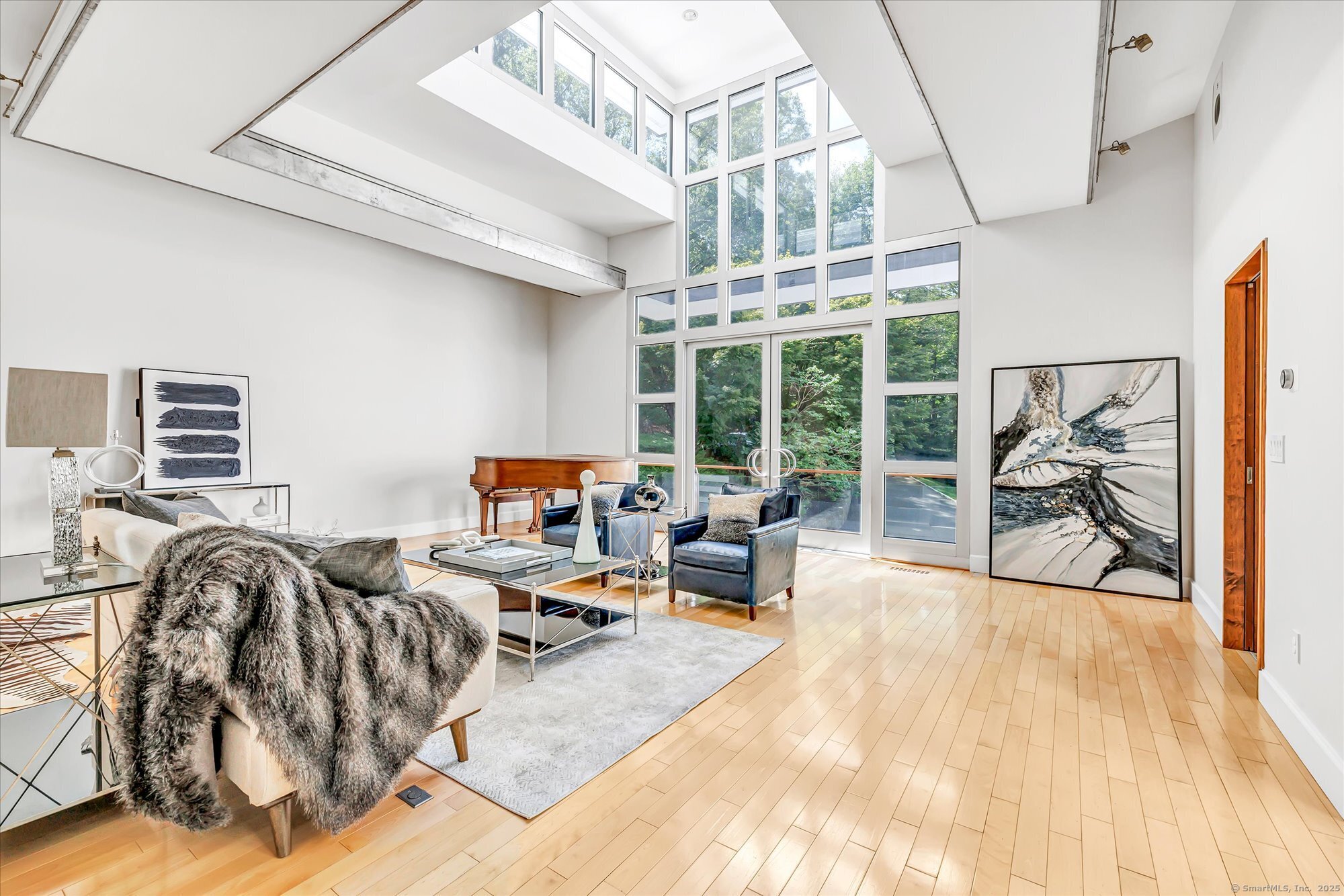 19 A Darbrook Road Westport, CT 06880 - Photo 8 of 40 a view of a livingroom with furniture and floor to ceiling window