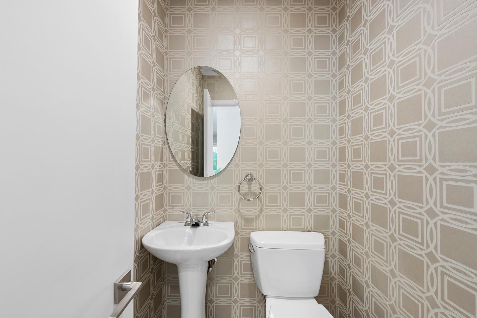 1605 Ridge Road Raleigh, NC 27607 - Photo 16 of 36 a bathroom with a toilet sink and mirror
