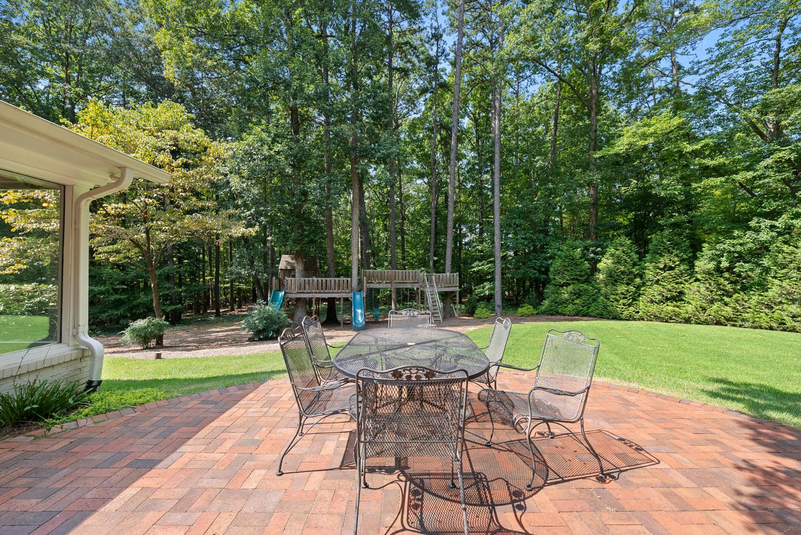 1605 Ridge Road Raleigh, NC 27607 - Photo 34 of 36 a view of a chair and table in the garden