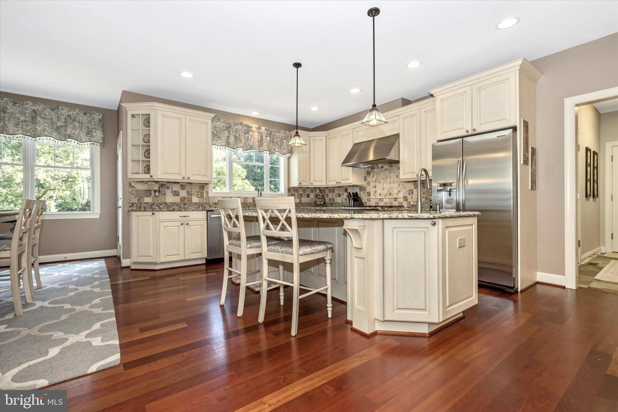 12134 Fulton Ridge Drive Fulton, MD 20759 - Photo 11 of 48 Massive granite island with seating area