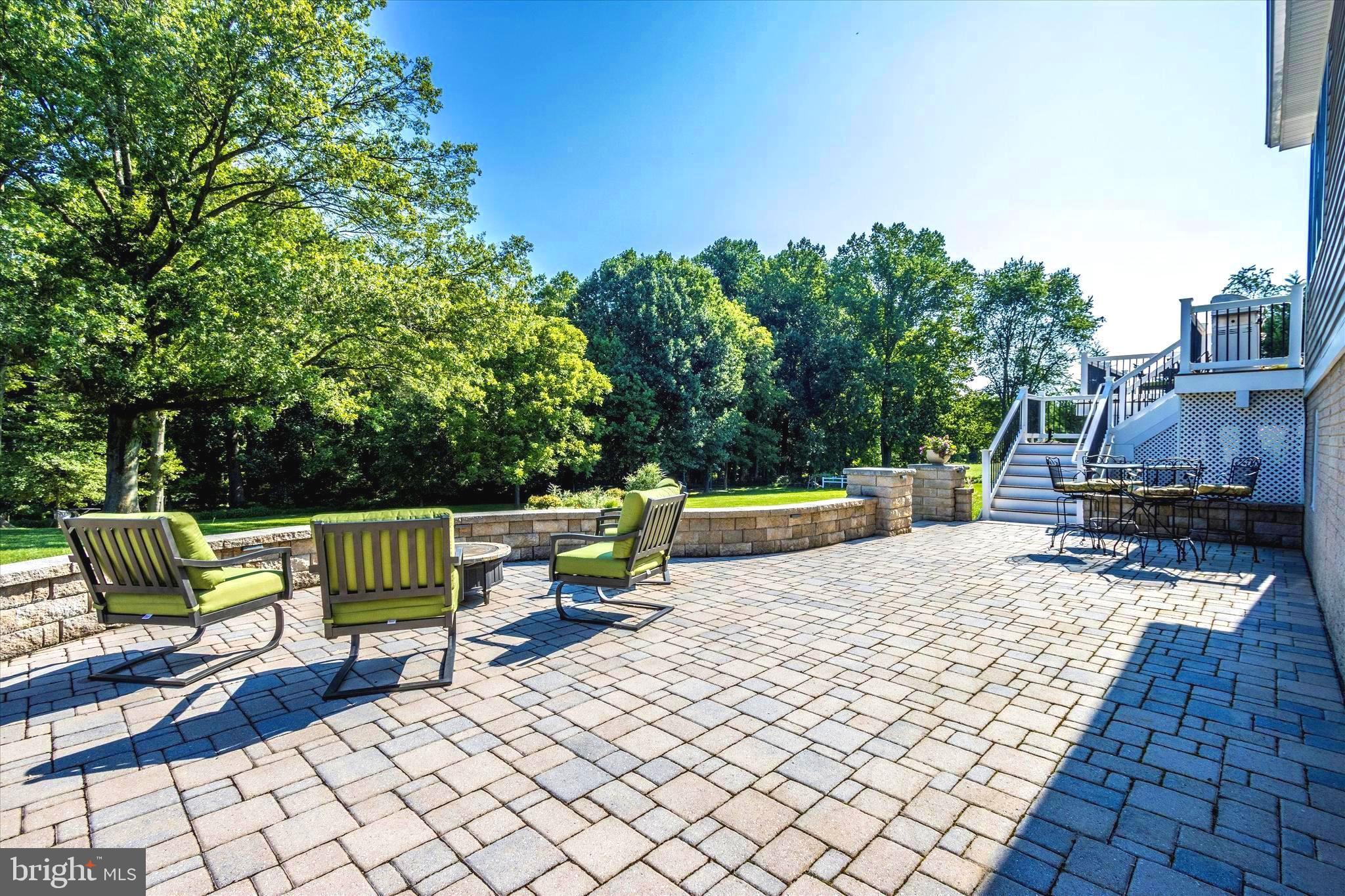 12134 Fulton Ridge Drive Fulton, MD 20759 - Photo 22 of 48 Huge ground level stone terrace w/stairs to deck