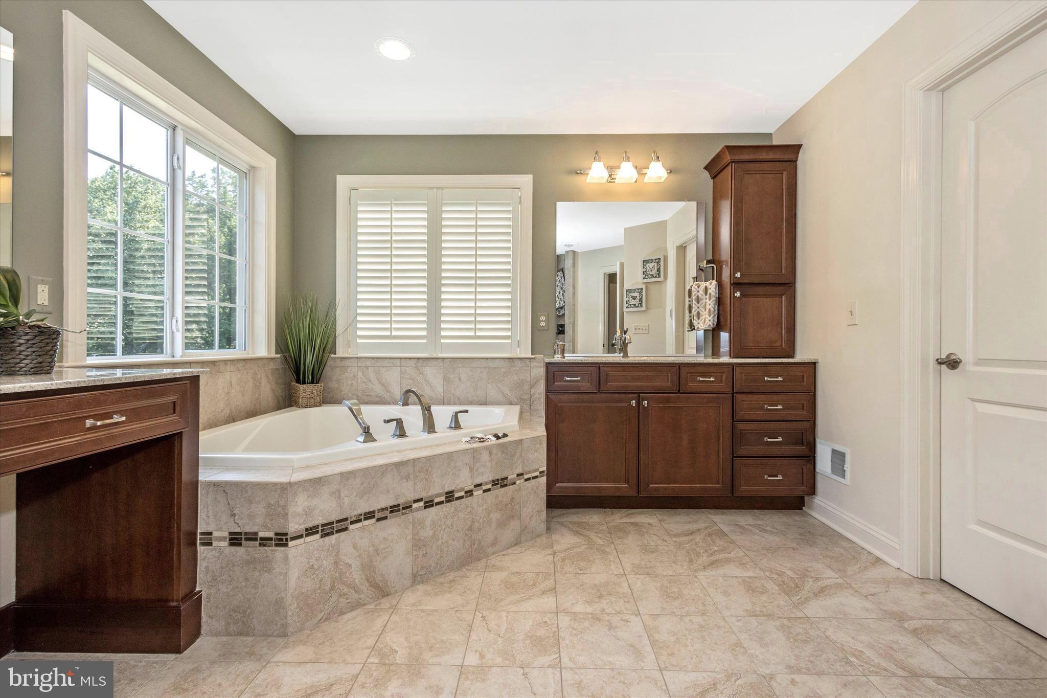 12134 Fulton Ridge Drive Fulton, MD 20759 - Photo 29 of 48 Double vanity areas, & a soaking tub to enjoy