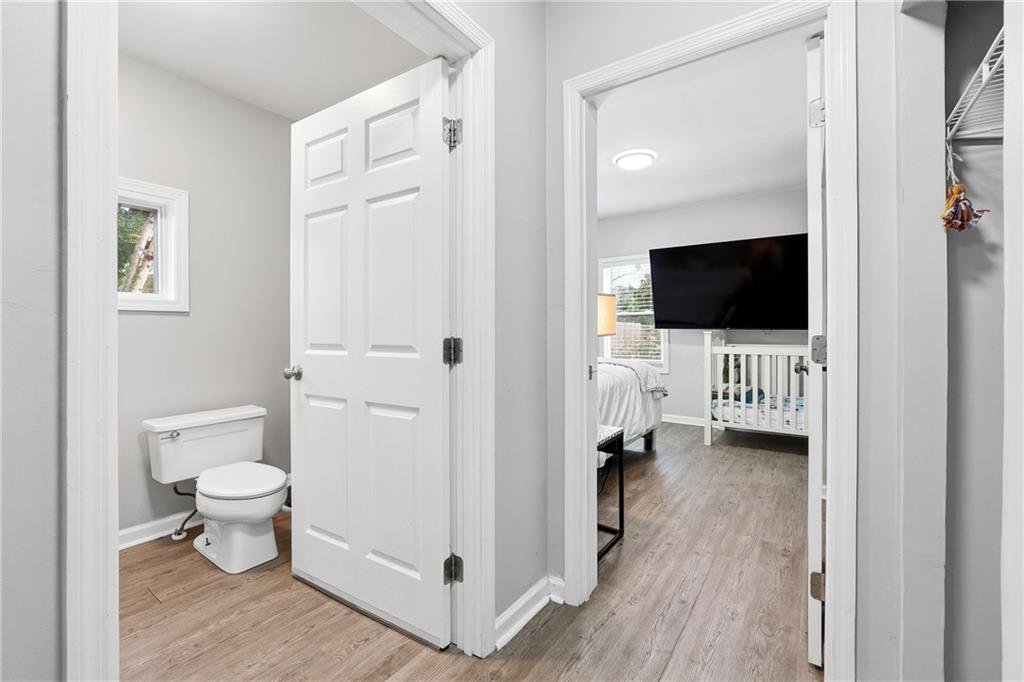 7 Willingham Street Rome, GA 30161 - Photo 20 of 25 a bathroom with a toilet sink and a mirror