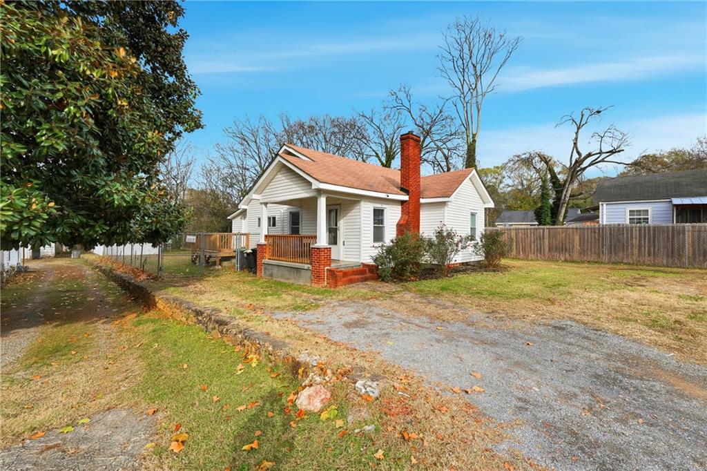 7 Willingham Street Rome, GA 30161 - Photo 2 of 25 a view of a house with a yard