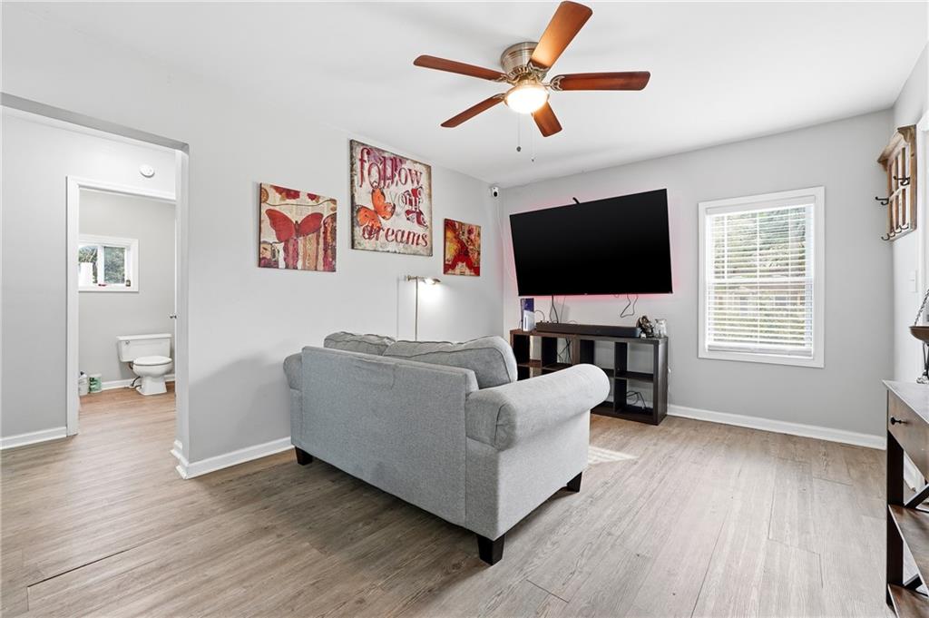 7 Willingham Street Rome, GA 30161 - Photo 9 of 25 a living room with furniture and a flat screen tv