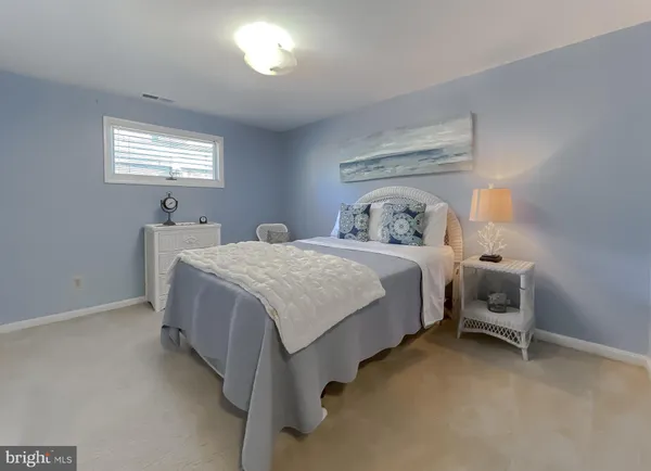 a bathroom with a shower curtain and a curtain