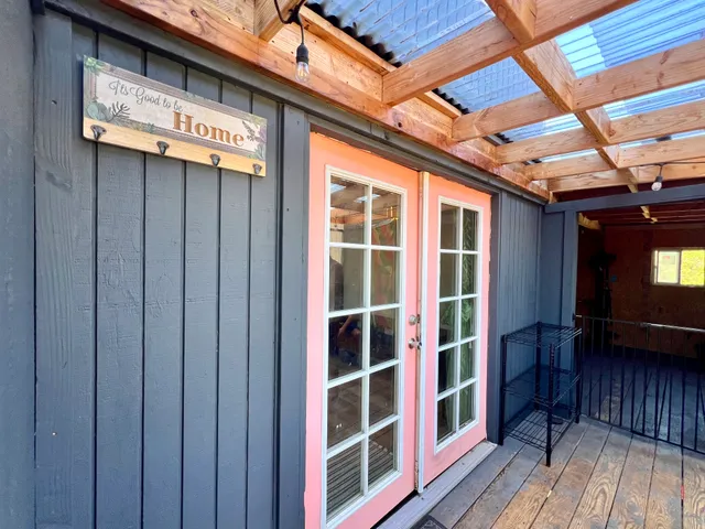 a view of a yard from a balcony