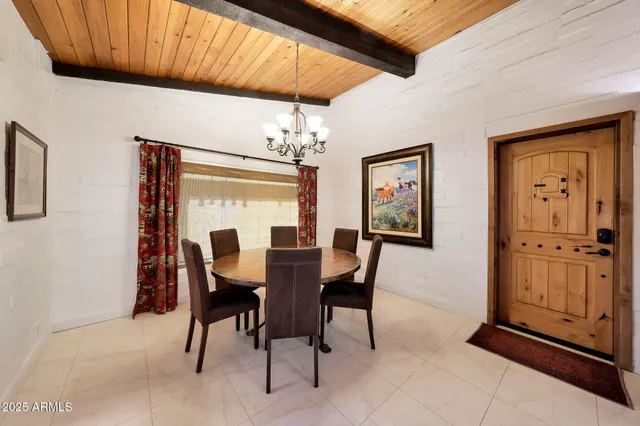 a view of a livingroom with furniture and a fireplace